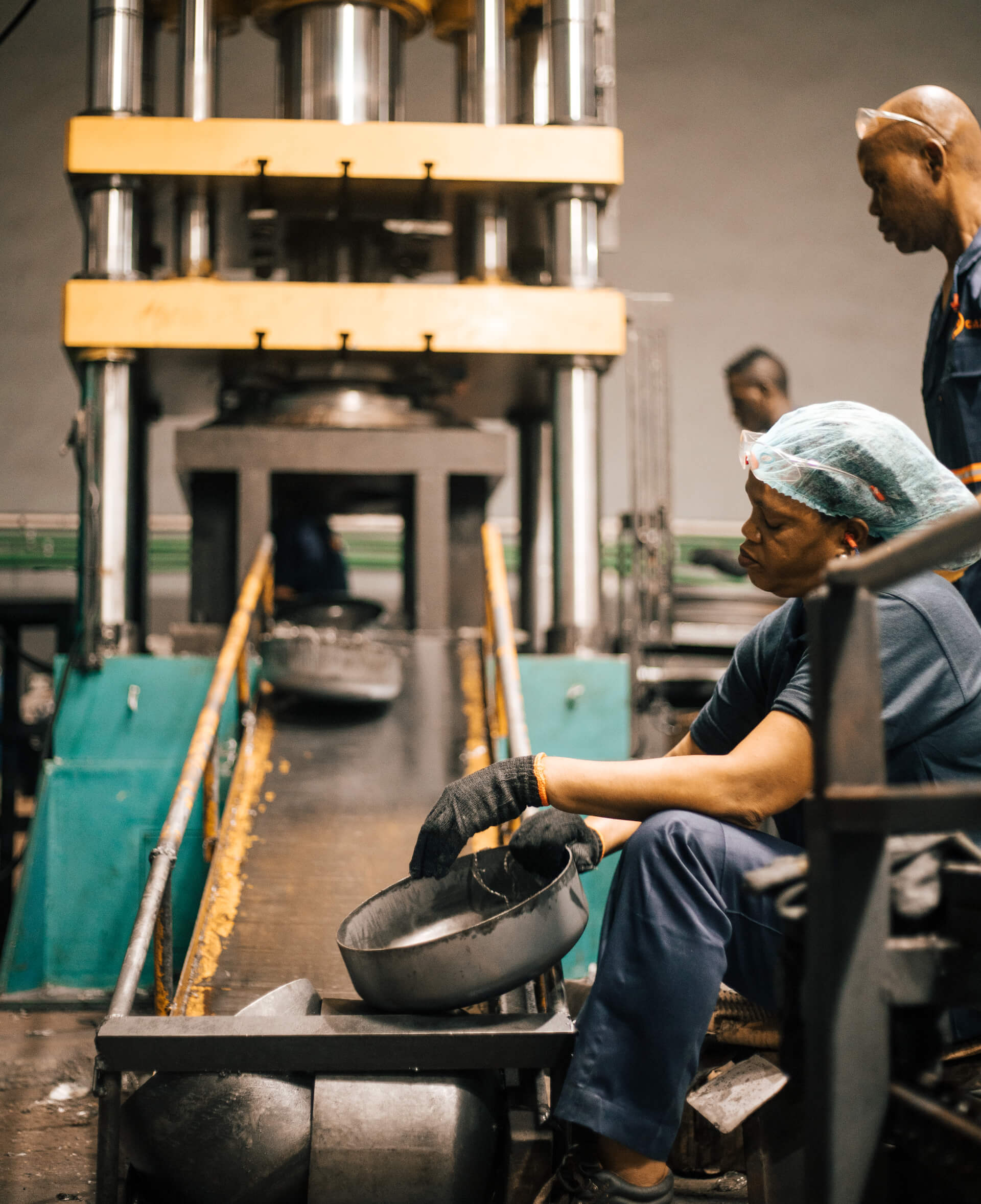 Dedicated Zen Limited's workers hard at work in the factory.